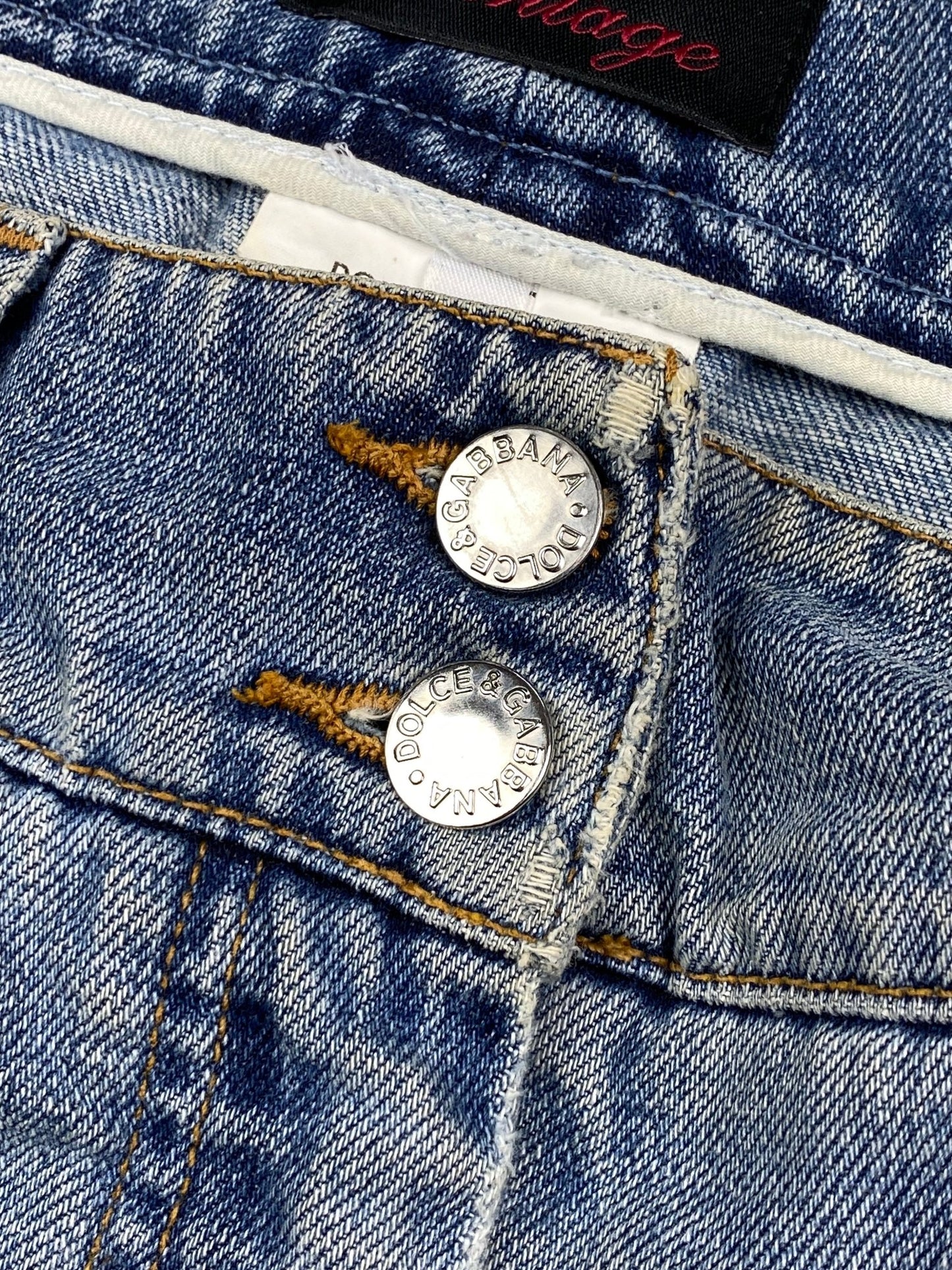DOLCE & GABBANA 'VINTAGE' DISTRESSED DENIM MINI SKIRT. (44 / M) - SEVENUES.
