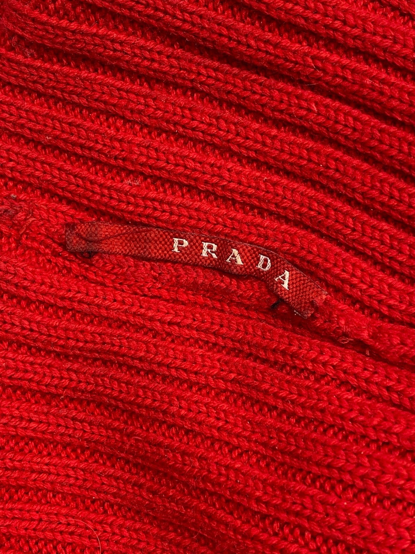 PRADA LINEA ROSSA KNITTED LOGO BEANIE. - SEVENUES.