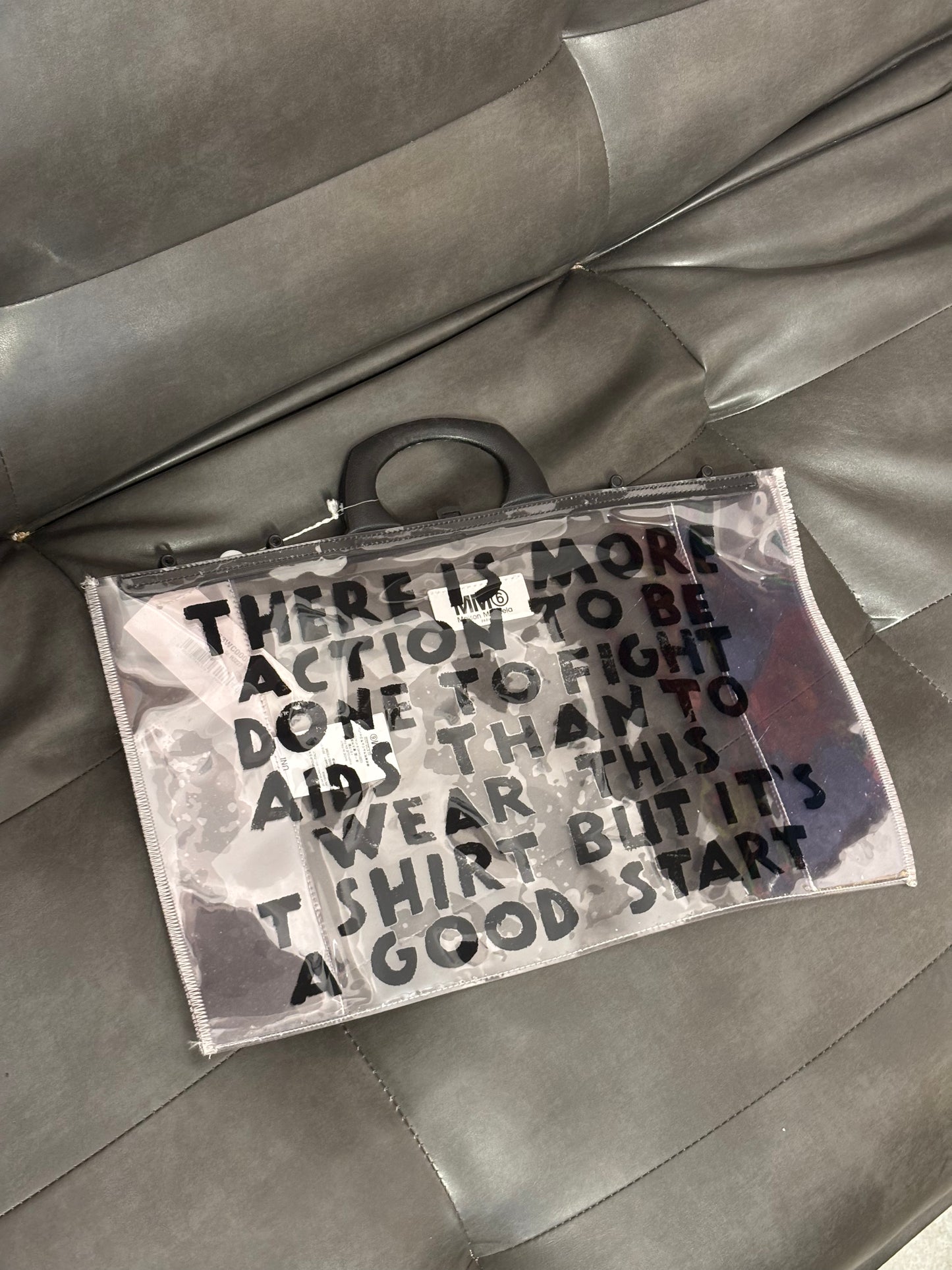 MAISON MARGIELA MM6 S/S 2019 AIDS CAMPAIGN TRANSPARENT PVC BAG.