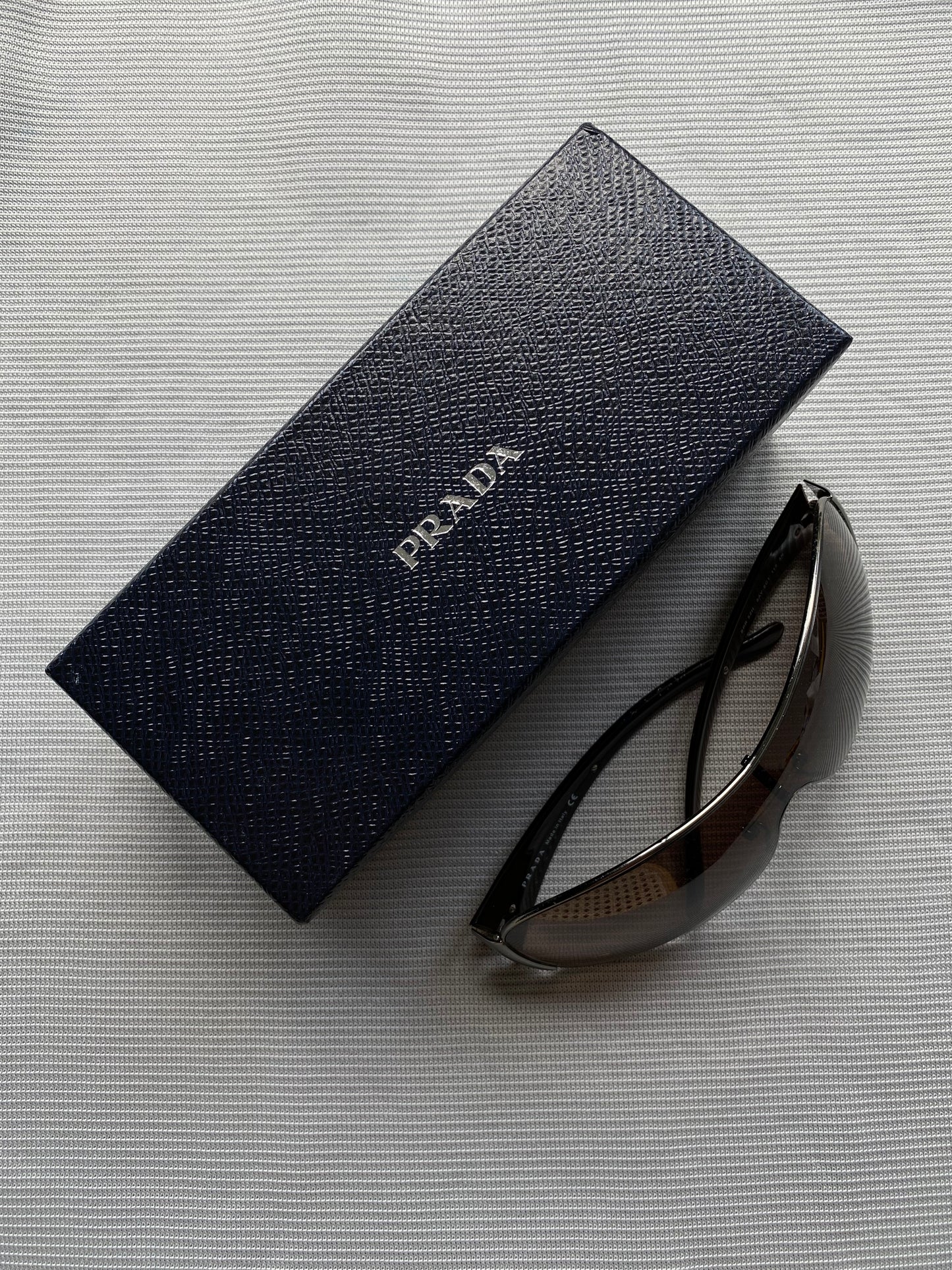 PRADA MILANO RACING SHIELD SUNGLASSES.