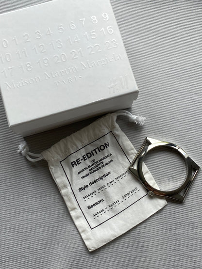 MAISON MARTIN MARGIELA X H&M ENLARGED WATCH FRAME BRACELET.