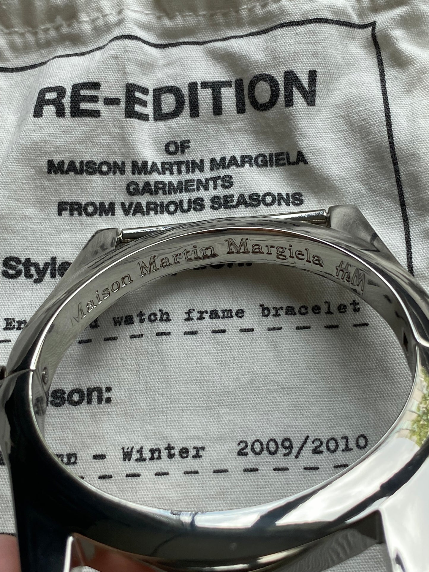 MAISON MARTIN MARGIELA X H&M ENLARGED WATCH FRAME BRACELET.