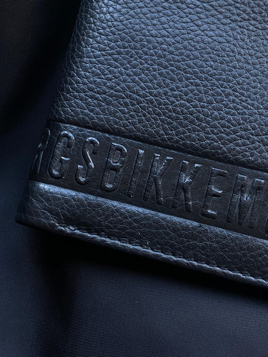 DIRK BIKKEMBERGS EMBOSSED LOGO LEATHER WALLET.