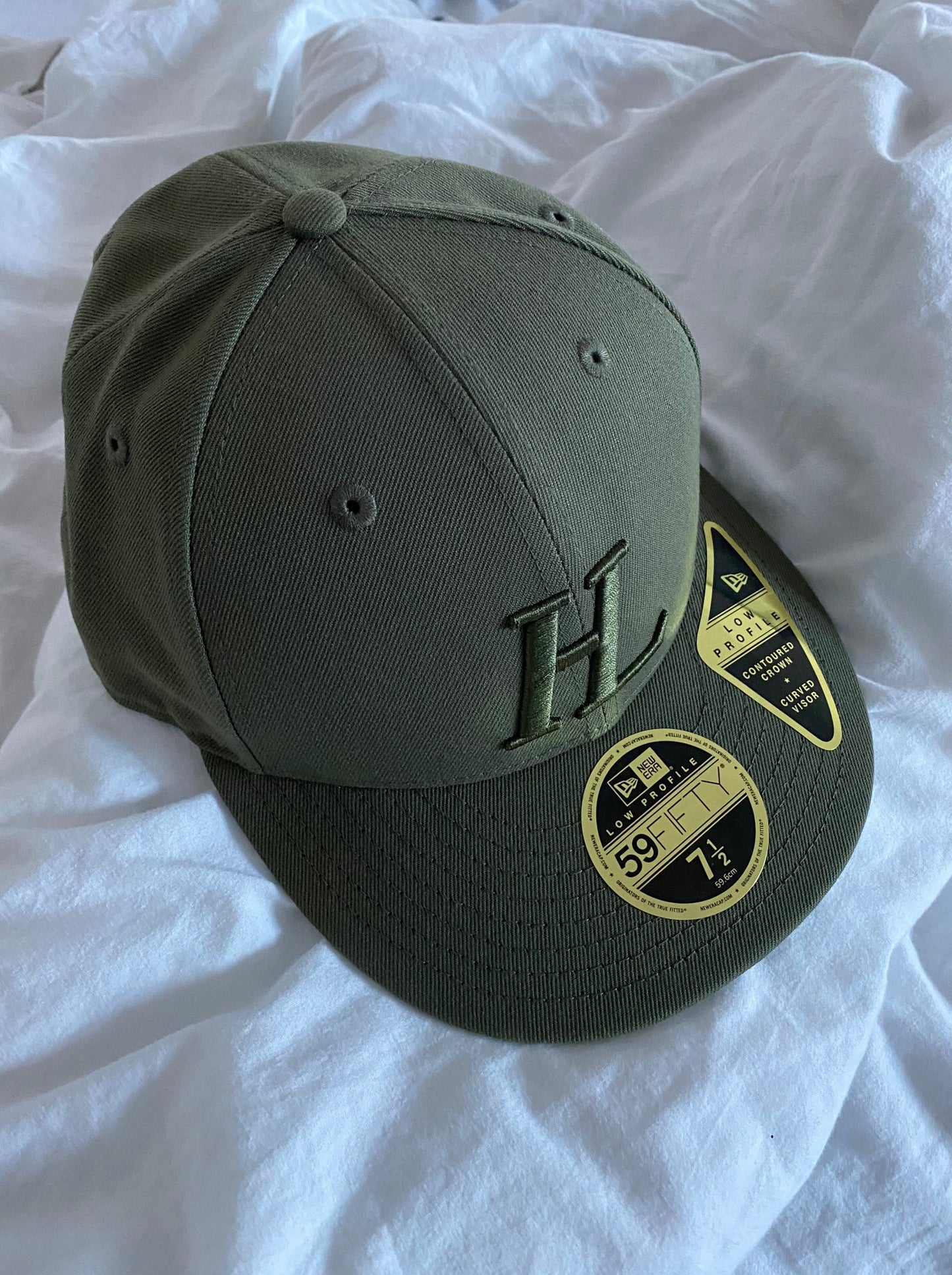 HELMUT LANG X NEW ERA LOW PROFILE FITTED HAT.