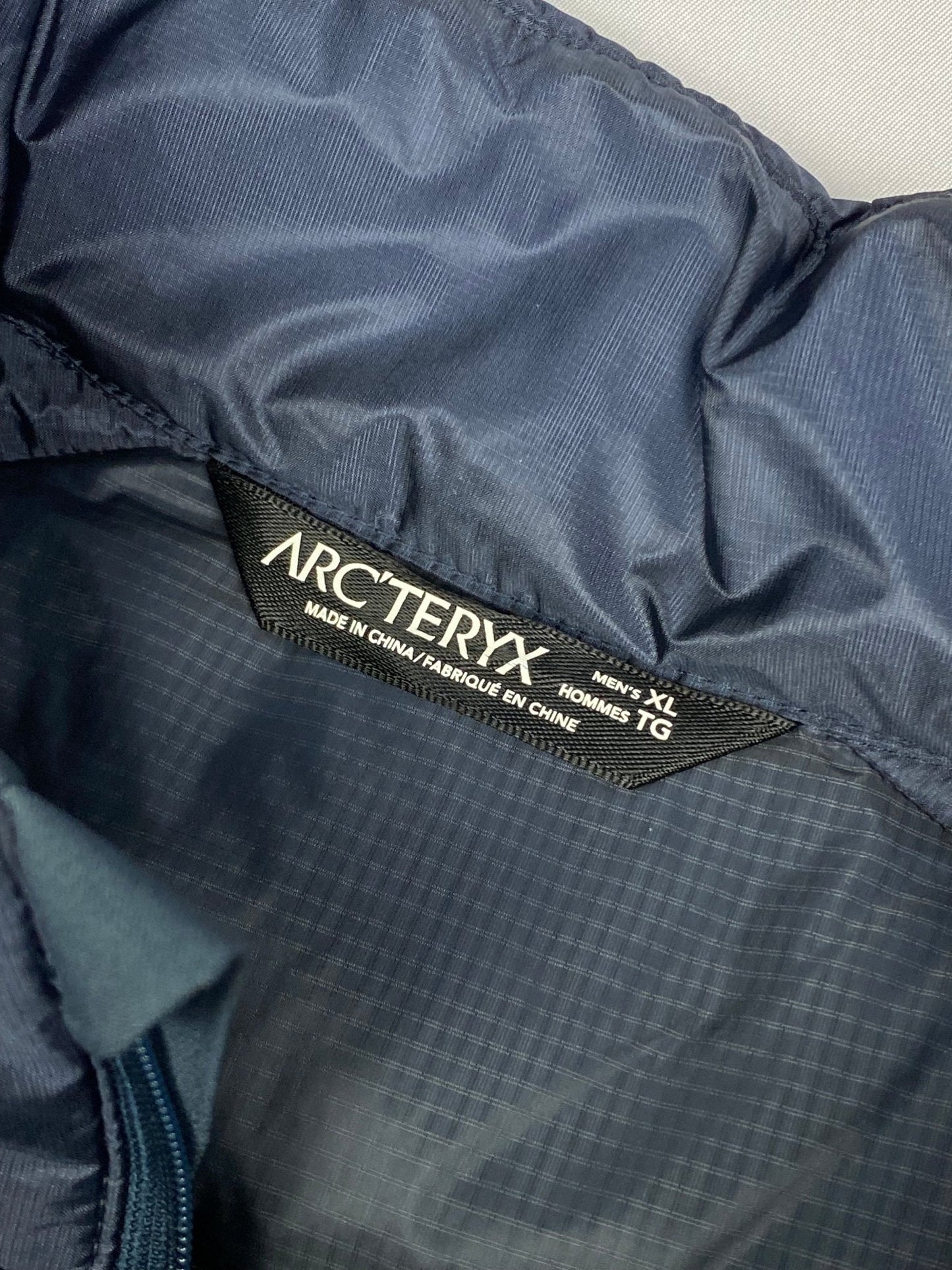 ARC'TERYX CERIUM LOGO EMBROIDERY DOWN VEST. (XL) - SEVENUES.