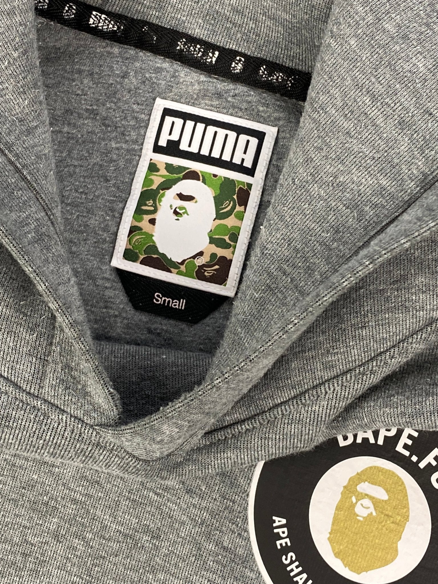 BAPE X PUMA 'BAPE. FC' HOODED SWEATSHIRT. (S) - SEVENUES.