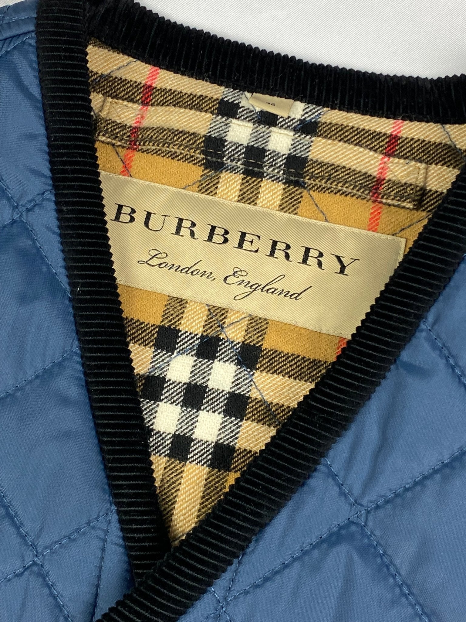 BURBERRY LONDON QUILTED VEST WITH NOVACHECK LINING. (46 / L) - SEVENUES.