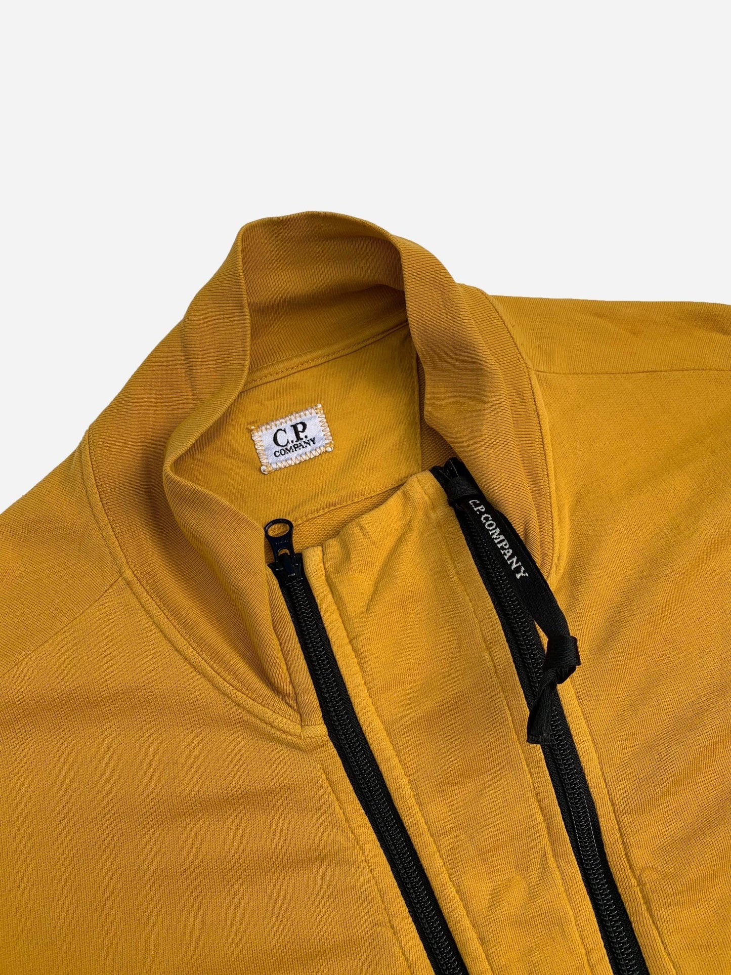 C.P. COMPANY ASYMMETRICAL ZIP - UP JACKET YELLOW. (XL) - SEVENUES.