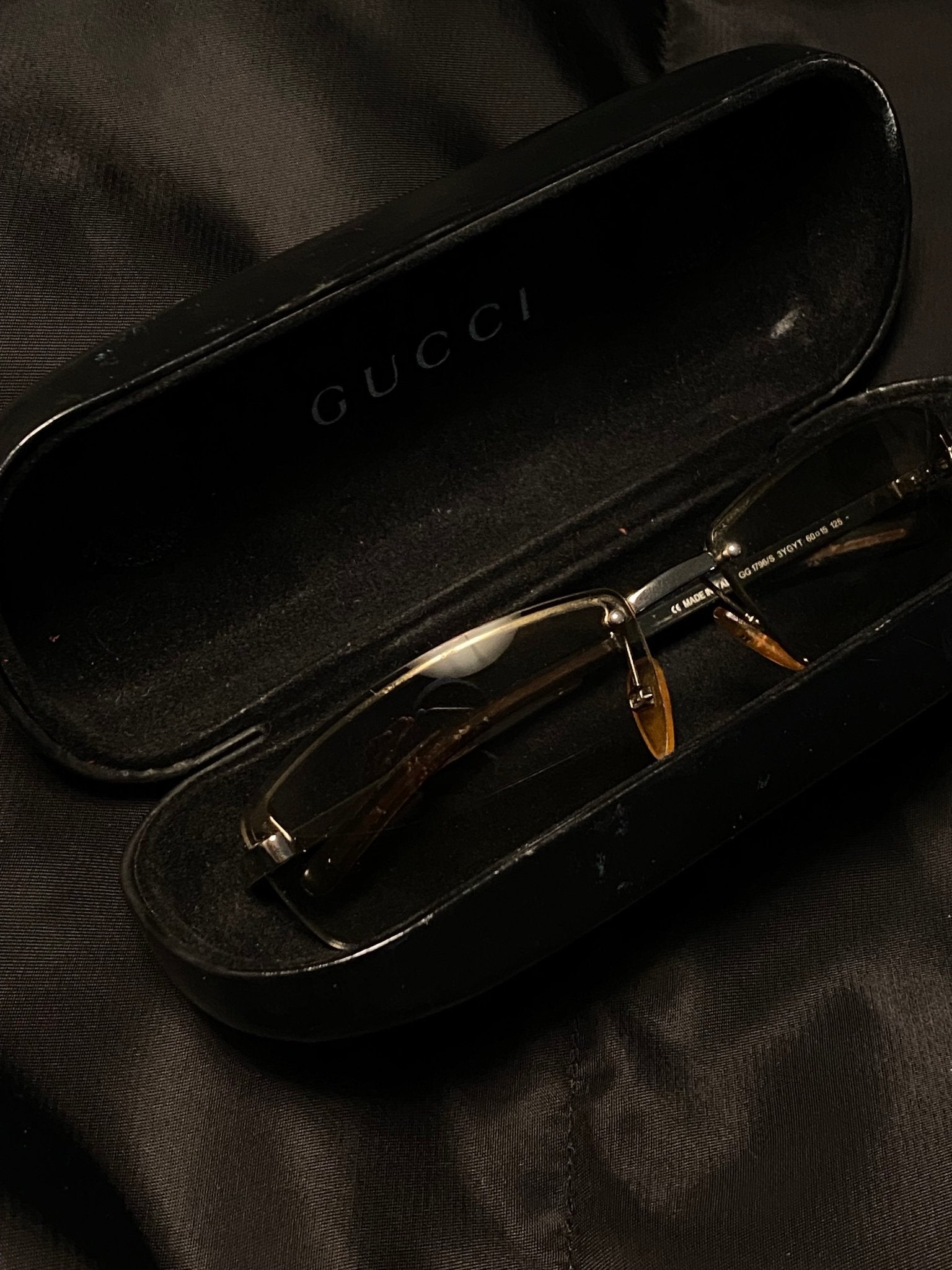 GUCCI 1990's RIMLESS LOGO SUNGLASSES. - SEVENUES.