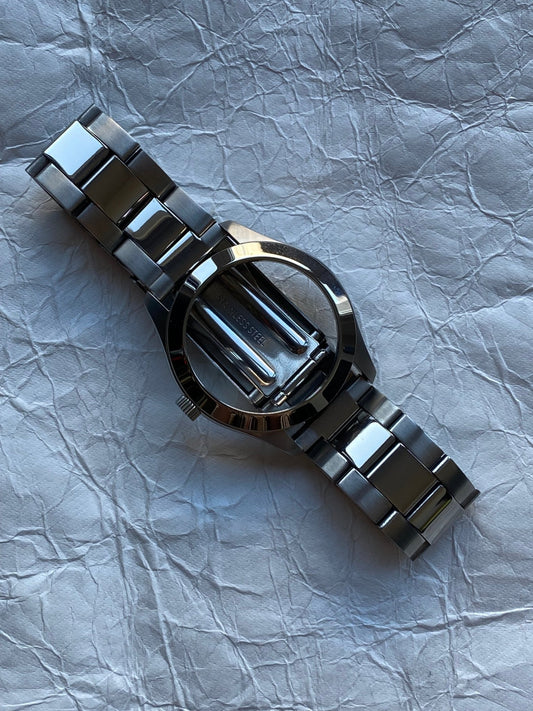 MAISON MARTIN MARGIELA X H&M RE - EDITION FACELESS WATCH BRACELET. - SEVENUES.