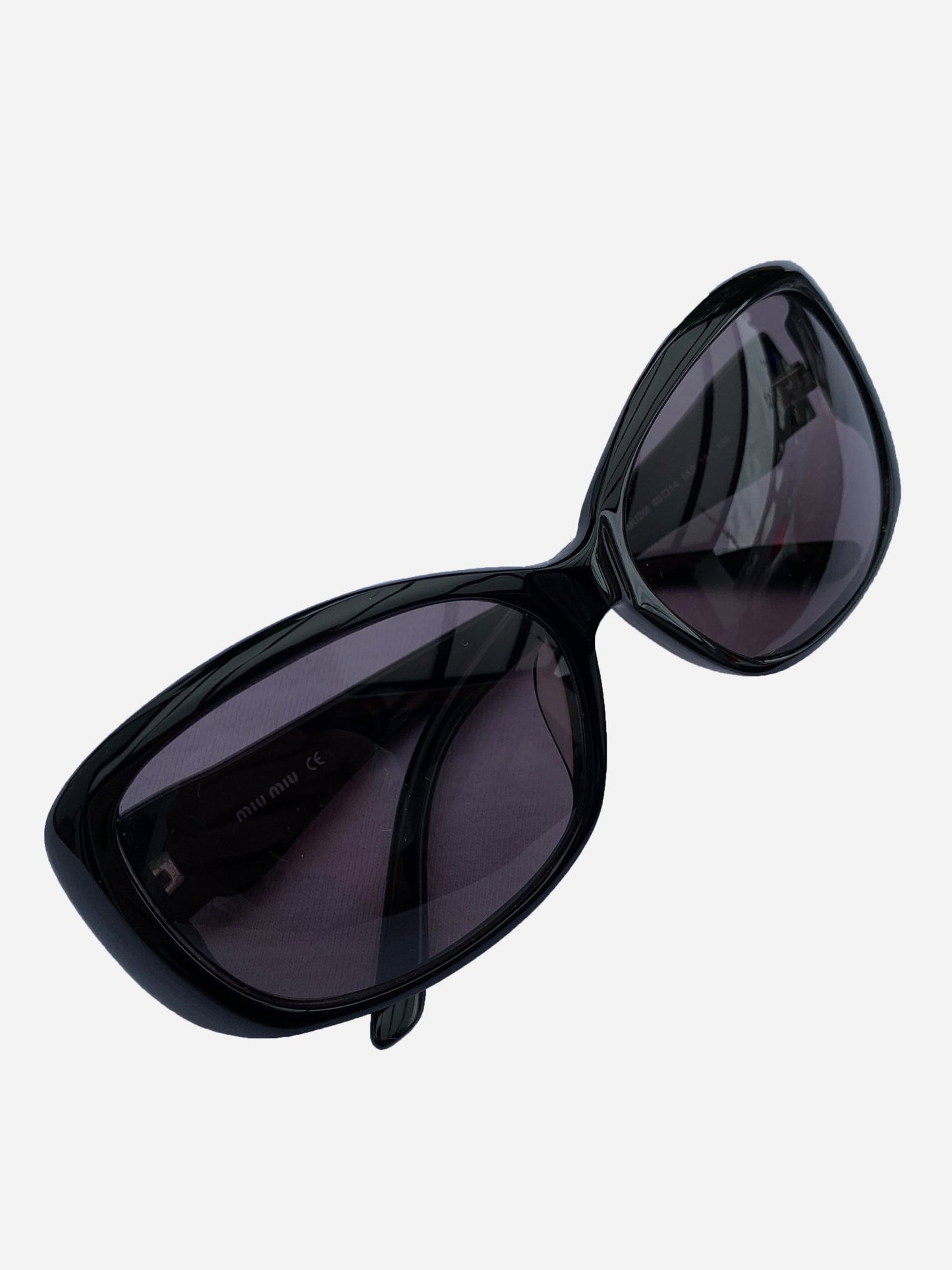 MIU MIU EYEWEAR 'SMU20I' BLACK SUNGLASSES. - SEVENUES.