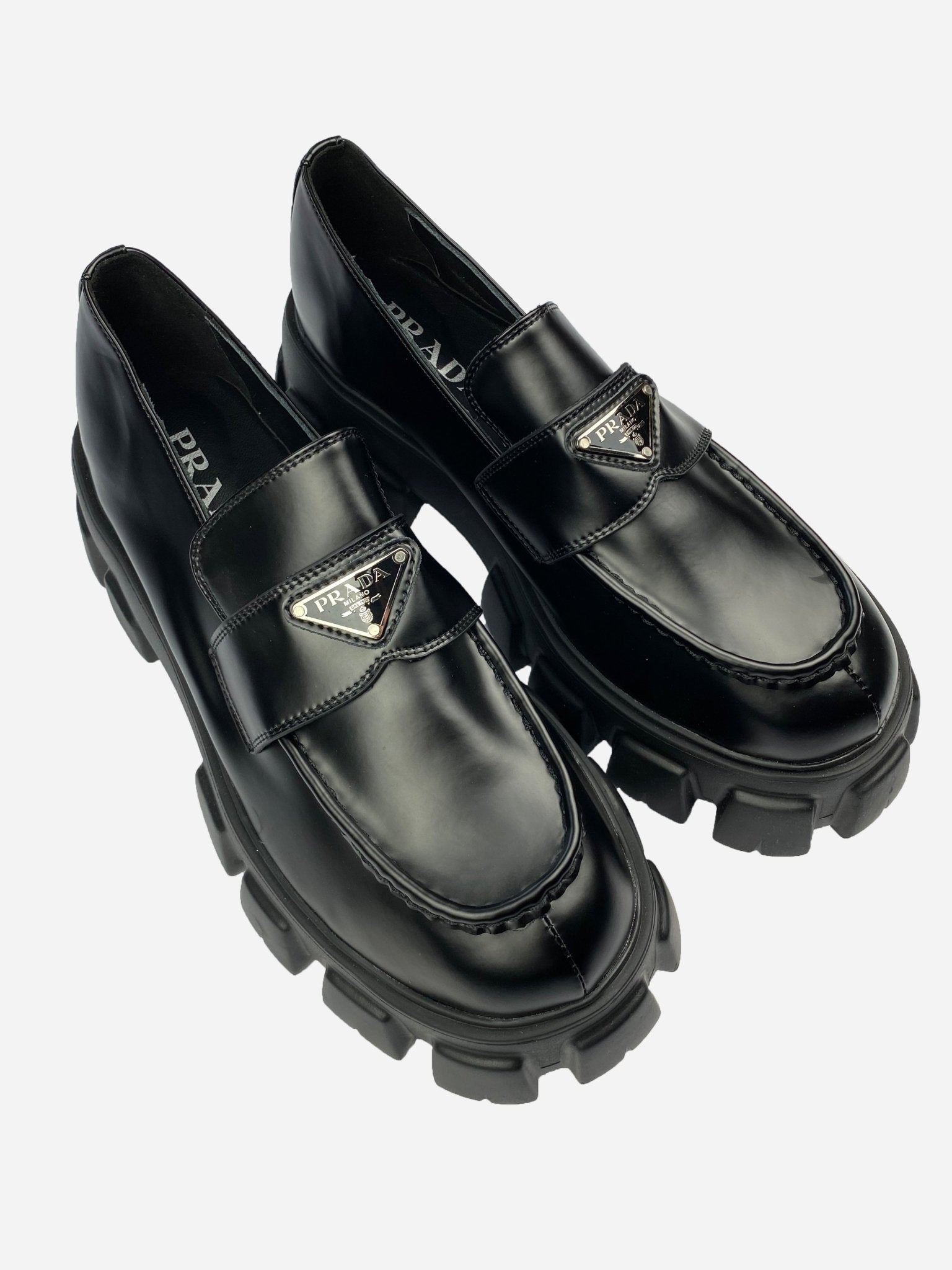 PRADA MILANO BRUSHED LEATHER MONOLITH LOAFERS. (44) - SEVENUES.