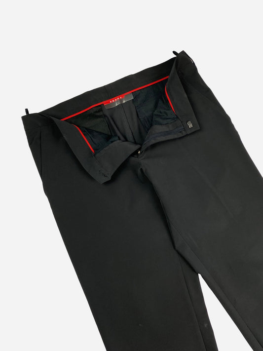 PRADA MILANO LEATHER PATCH GARBADINE NYLON SUIT PANTS. (50 / M) - SEVENUES.