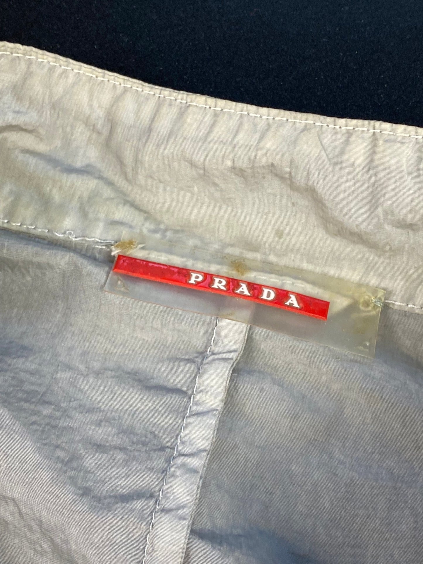 PRADA MILANO LINEA ROSSA RUBBER PATCH NYLON JACKET. (48 / M) - SEVENUES.