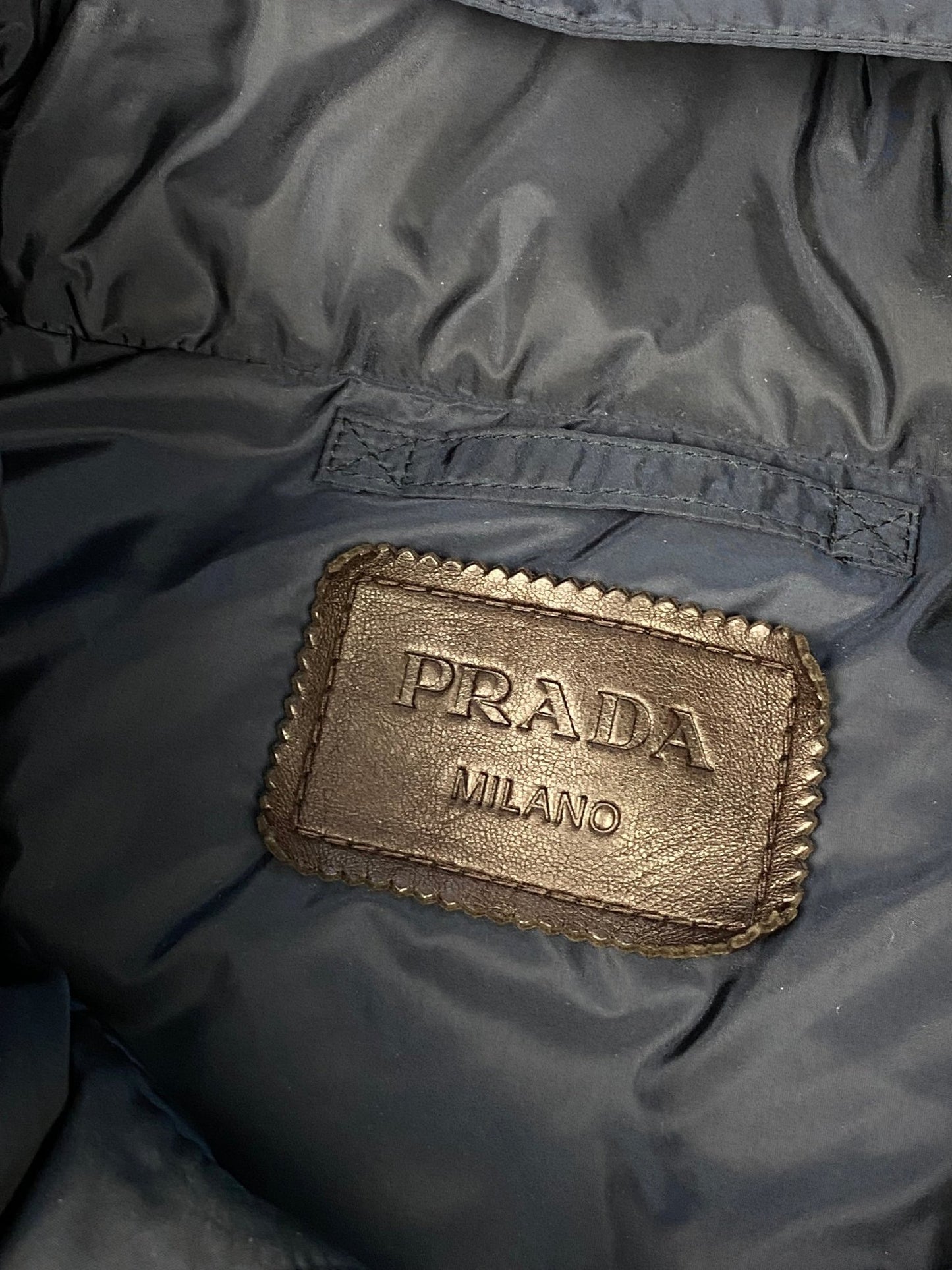 PRADA MILANO PIUMINO DOWN JACKET WITH LEATHER DETAILING. (50 / M) - SEVENUES.