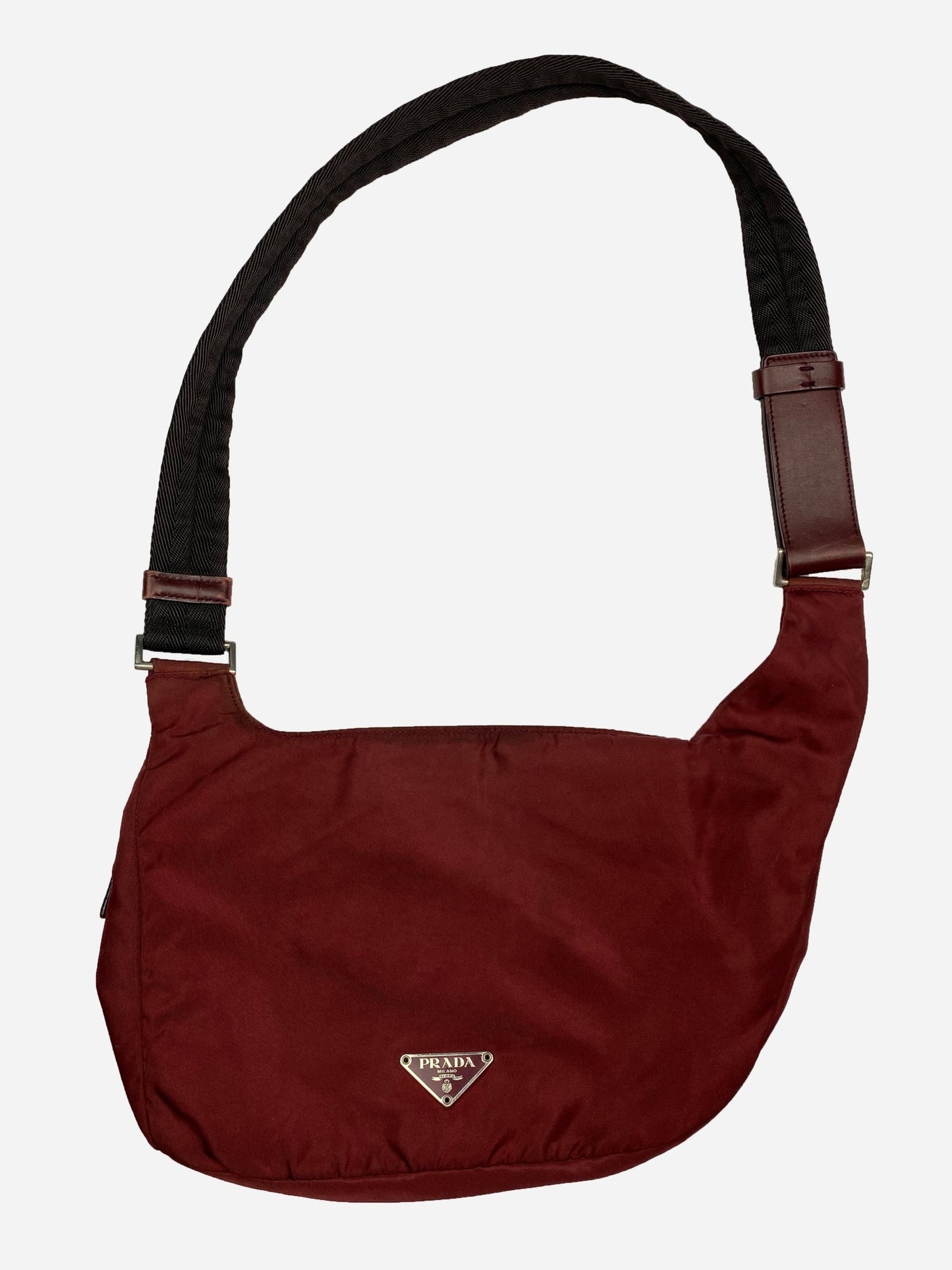 PRADA MILANO REVERSIBLE NYLON SLING BAG IN BURGUNDY. - SEVENUES.