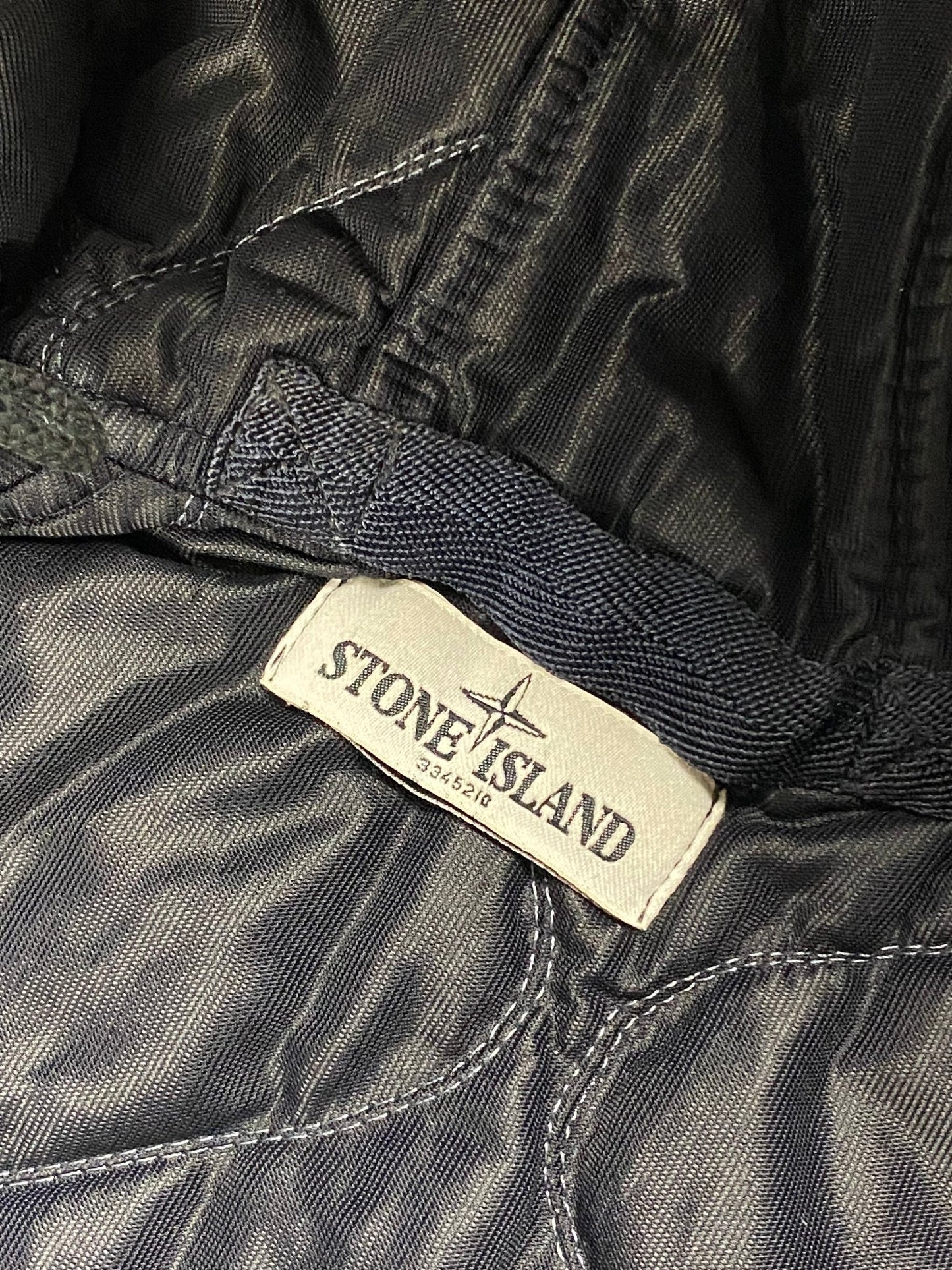 STONE ISLAND MUSSOLA GOMMATA 30 ANNI JACKET. (L) - SEVENUES.