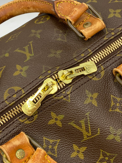 LOUIS VUITTON KEEPALL 55 MONOGRAM WEEKENDER BAG.