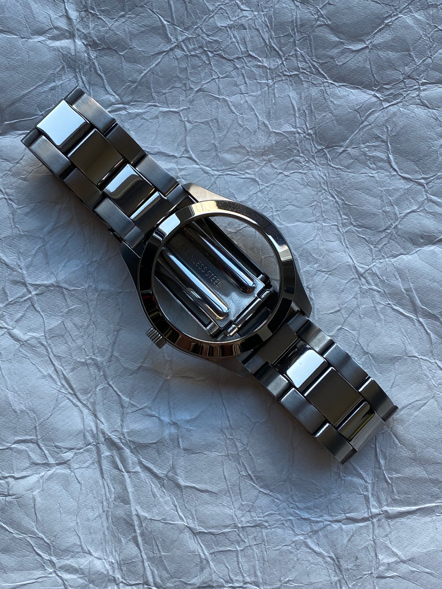 MAISON MARTIN MARGIELA X H&M RE-EDITION FACELESS WATCH BRACELET.