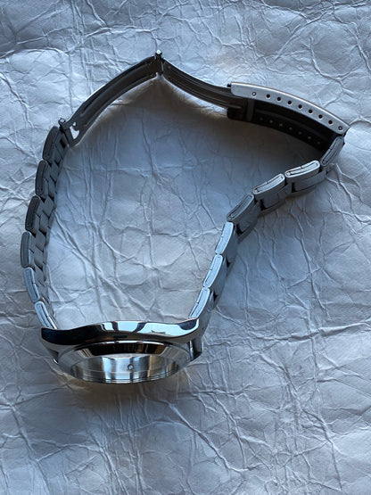 MAISON MARTIN MARGIELA X H&M RE-EDITION FACELESS WATCH BRACELET.