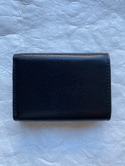 FURLA TRI-FOLD LOGO LEATHER WALLET.