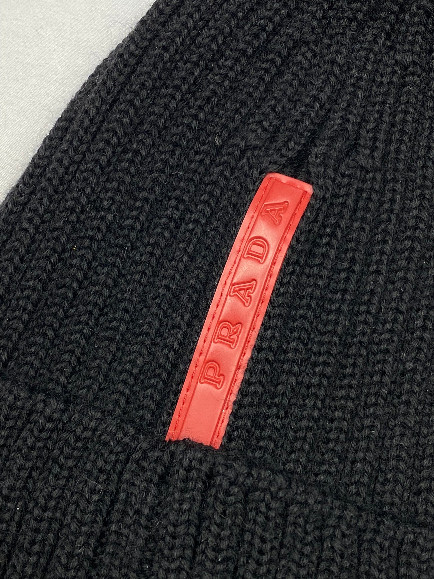 PRADA MILANO LINEA ROSSA KNITTED BEANIE.