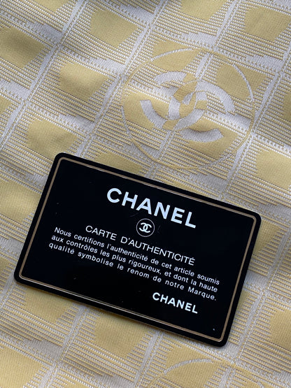 CHANEL TRAVEL LINE 'CC' MONOGRAM NYLON HAND BAG.