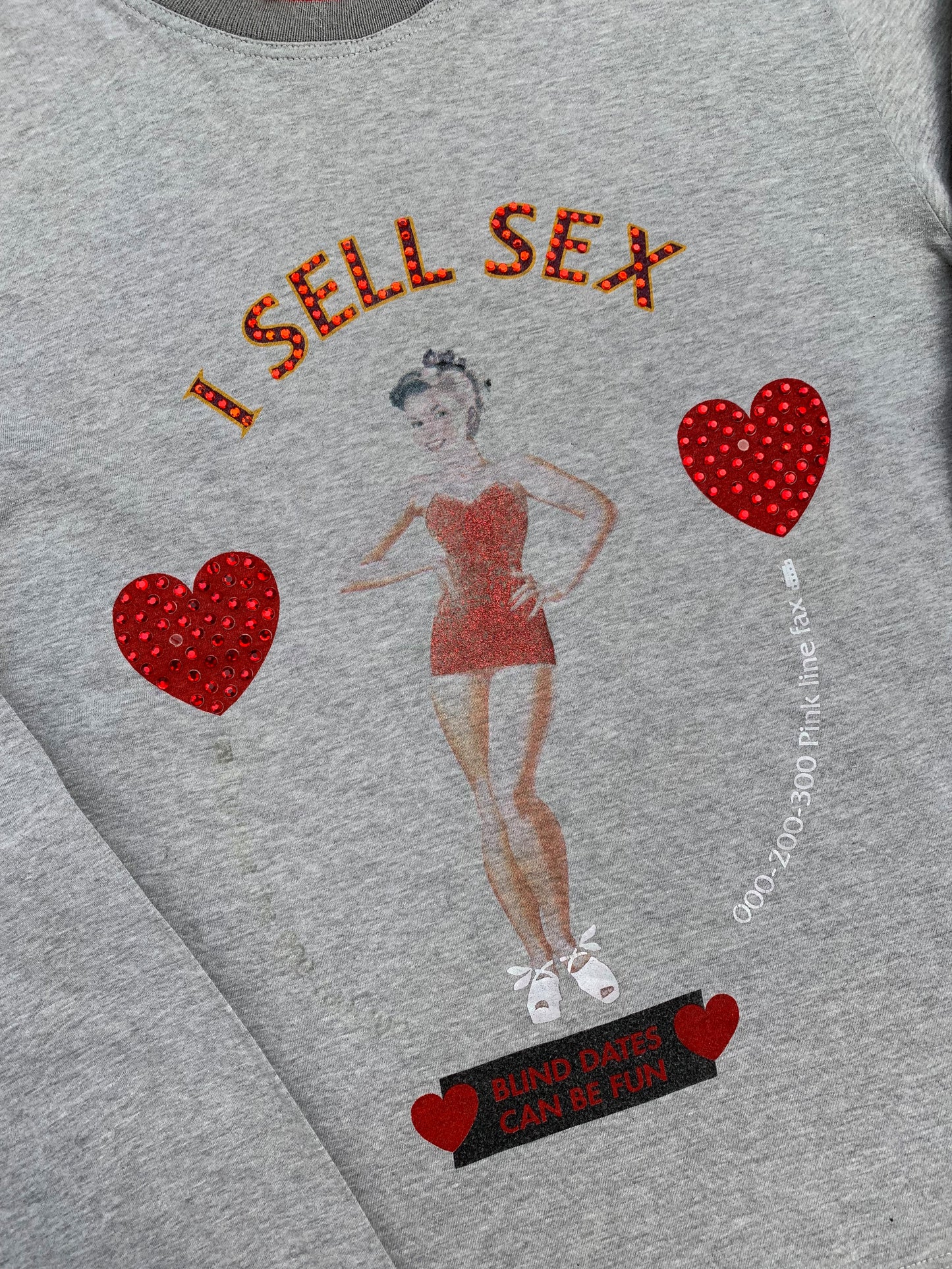 DOLCE & GABBANA 'I SELL SEX' RHINESTONE LONGSLEEVE SWEATER. (50 / M)