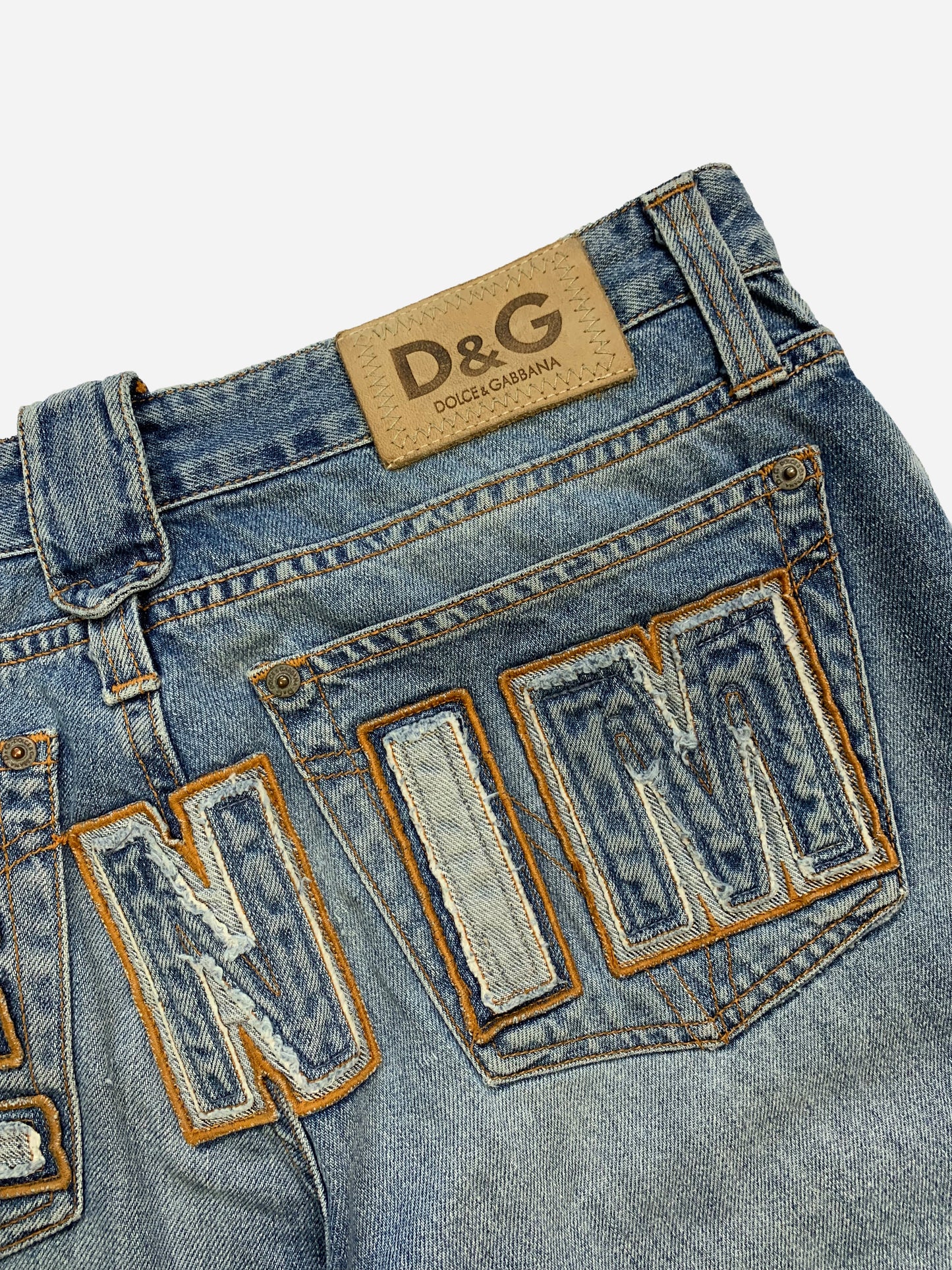 DOLCE & GABBANA 'DENIM' SPELLOUT EMBROIDERY JEANS. (33)