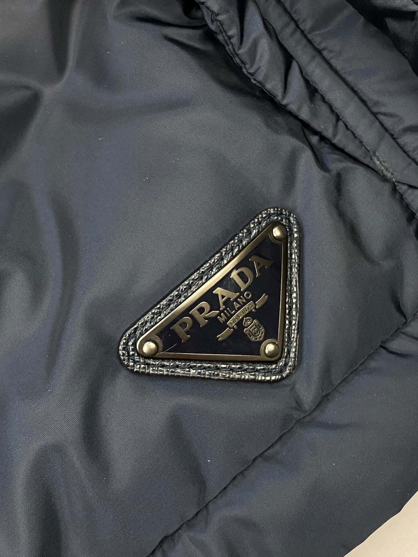 PRADA MILANO PIUMINO DOWN JACKET WITH LEATHER DETAILING. (50 / M)